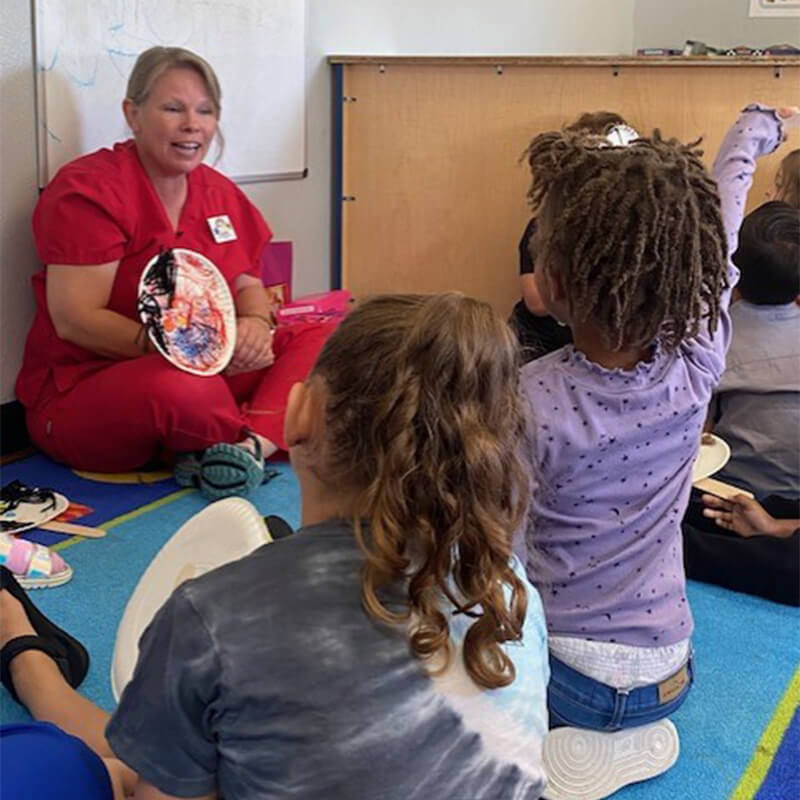 Teacher reading to Kids