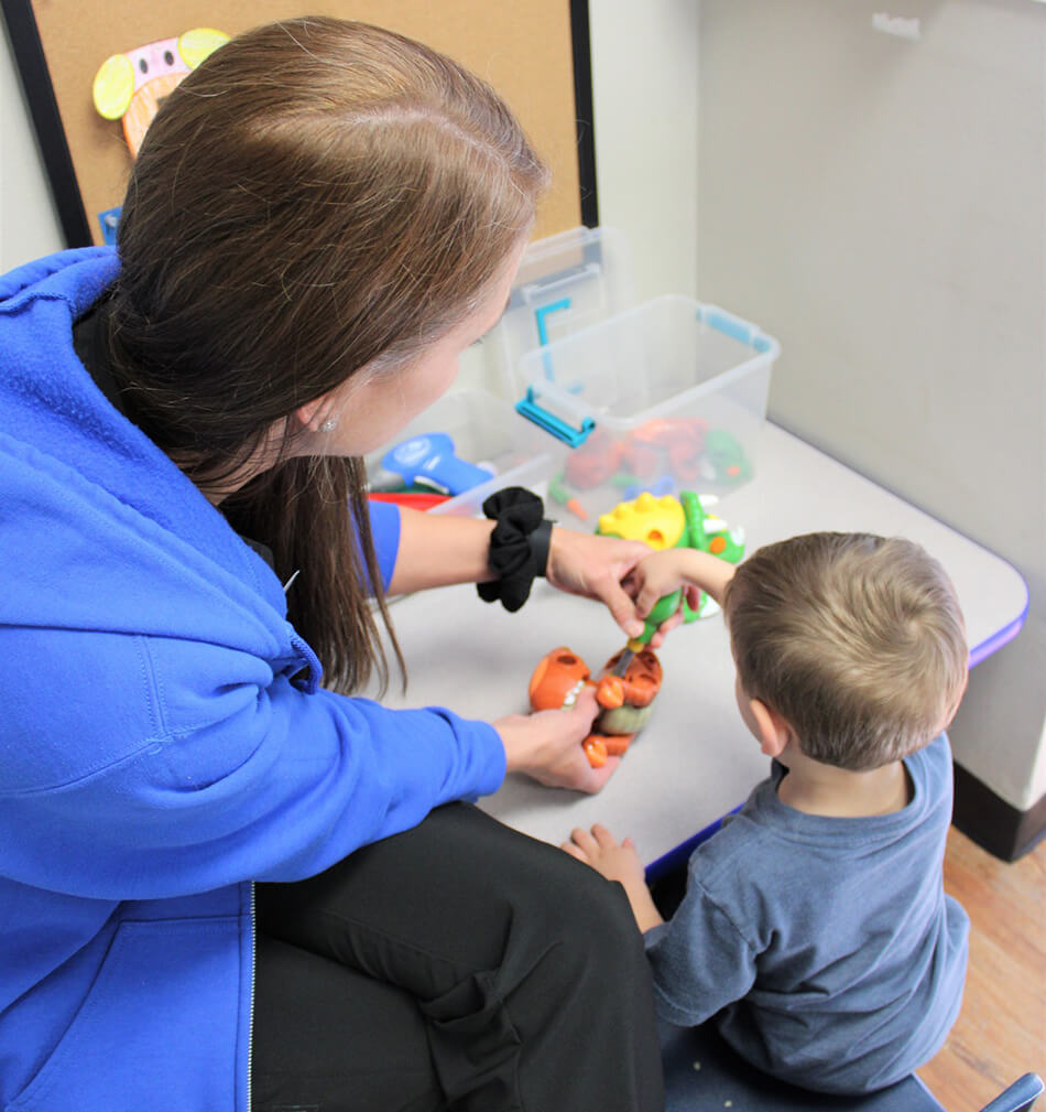 Child playing with toys